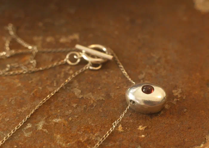 Beach Pebble Necklace with Garnet