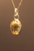 The Golden Illuminator: Rutile Quartz Pendant