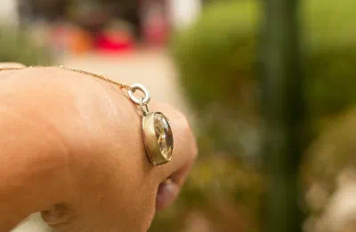 The Golden Illuminator: Rutile Quartz Pendant