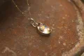 The Golden Illuminator: Rutile Quartz Pendant