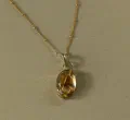 The Golden Illuminator: Rutile Quartz Pendant